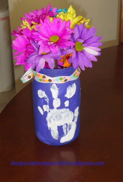 Hand print mason jar flower vase by The Special Mom's World.